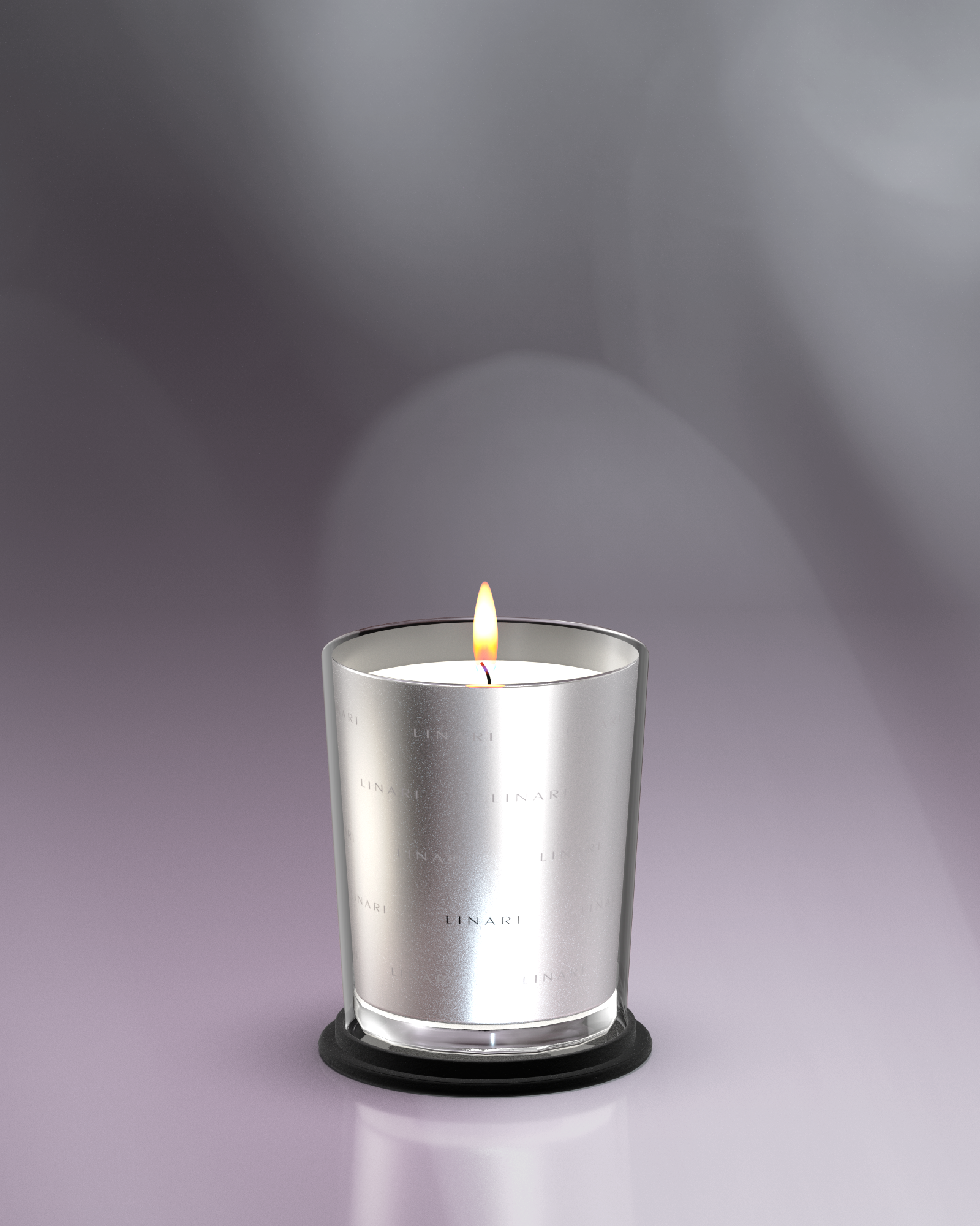 FENICE scented candle by LINARI in high-gloss silver, two-tone coated glass with a warm flame.