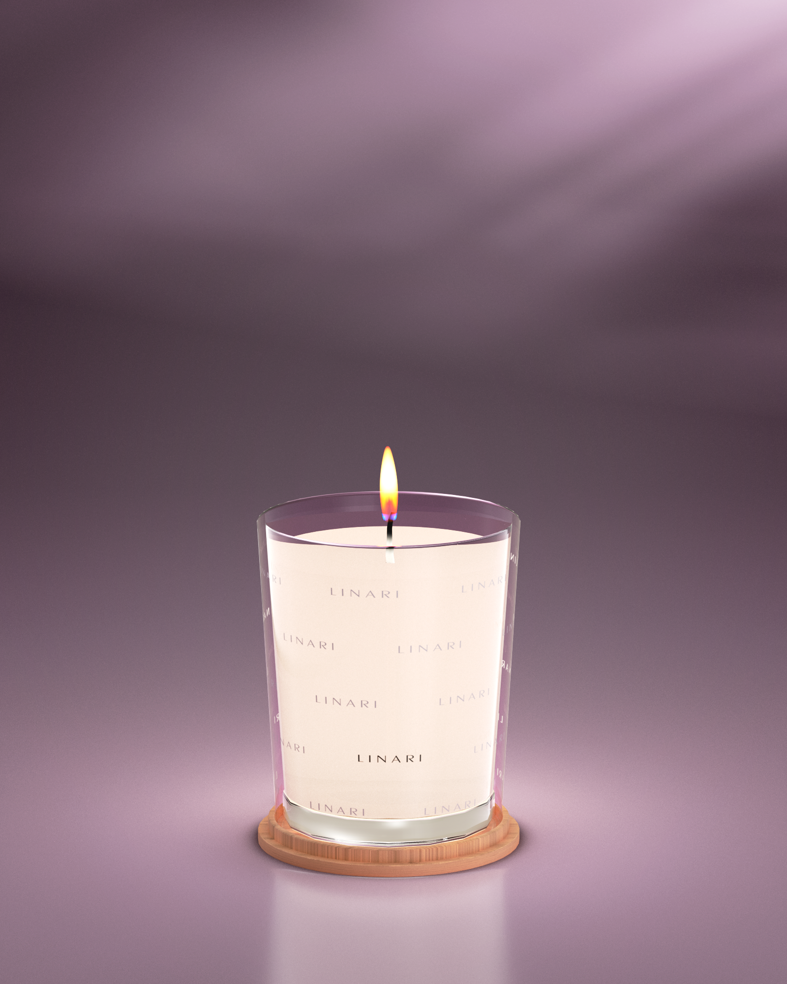 RUBINO scented candle by LINARI, burning in decorated transparent French glass on a maple-wood lid